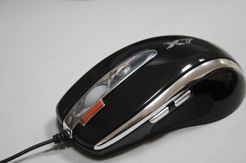 Fancy computer mouse with silver back and forward button on the side